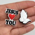 A Set Of 18 Jesus Croc Charms