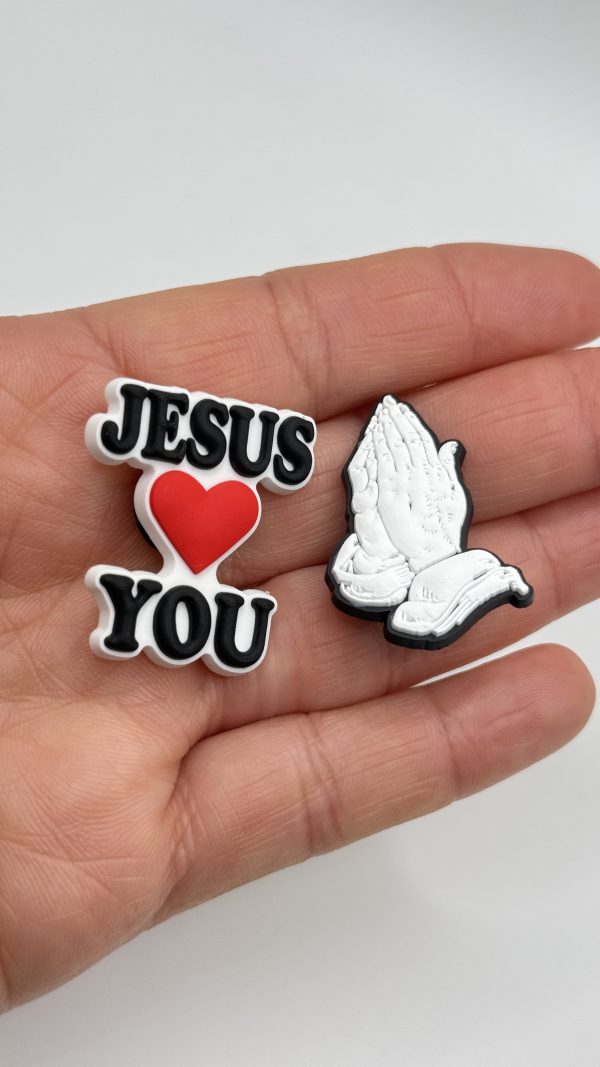 A Set Of 18 Jesus Croc Charms