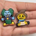 A Set Of 14 Halloween Horror Croc Charms