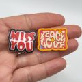 A Set Of 25 Love Heart Croc Charms