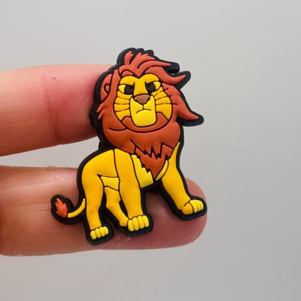 A Set Of 13 Lion King Croc Charms