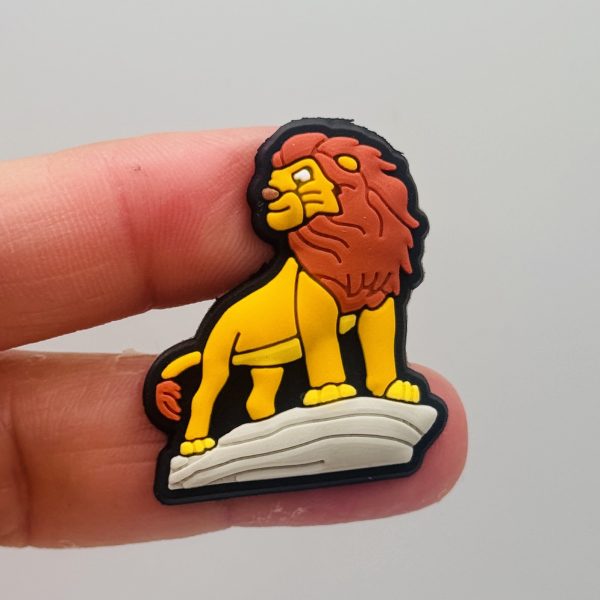 A Set Of 13 Lion King Croc Charms