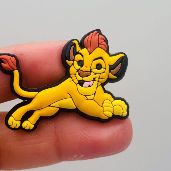A Set Of 13 Lion King Croc Charms