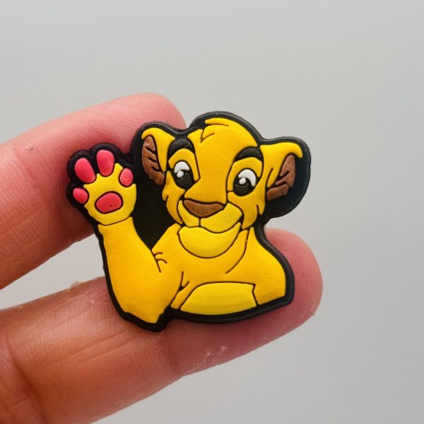 A Set Of 13 Lion King Croc Charms