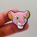 A Set Of 13 Lion King Croc Charms