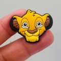 A Set Of 13 Lion King Croc Charms