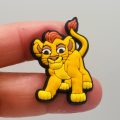A Set Of 13 Lion King Croc Charms