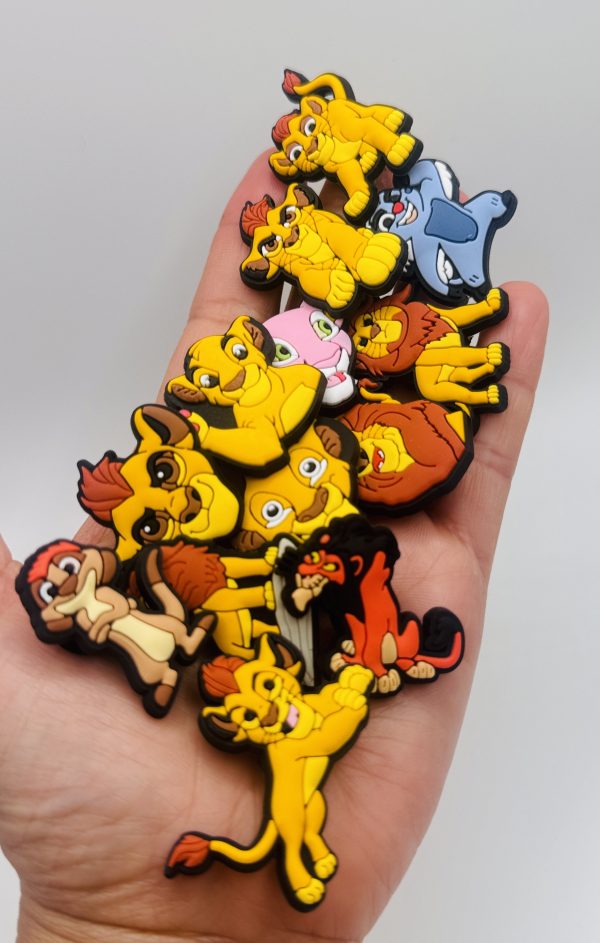 A Set Of 13 Lion King Croc Charms