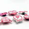 A Set Of 6 Barbie Croc Charms