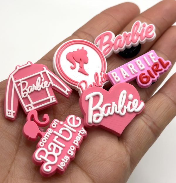 A Set Of 6 Barbie Croc Charms