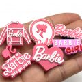 A Set Of 6 Barbie Croc Charms